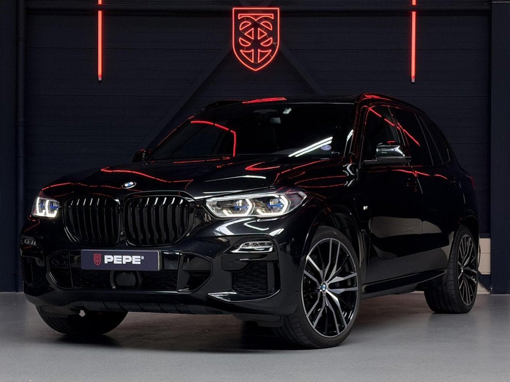 BMW X5 xDrive45e High Exec. M-SPORT|PANO|TREK.|HUD|LASER|ACC, Gebruikt, 394 pk, Zwart, Leder