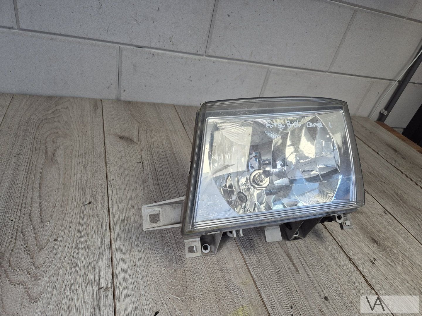 Mitsubishi Canter 2009 - 2013 koplamp links schadevrij €100, Auto-onderdelen, Gebruikt, -, -, Ophalen of Verzenden