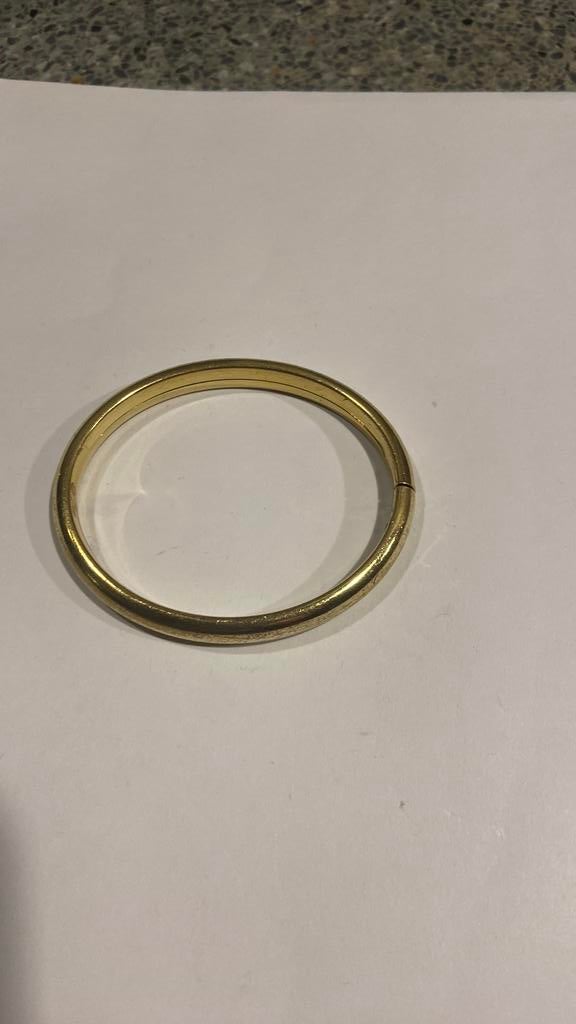 Armband double 7 cm doorsnee gemerkt opde sluiting., Ophalen of Verzenden, Overige materialen, Armband, Verguld