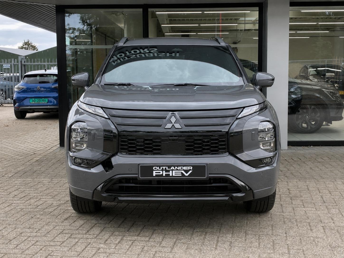 Mitsubishi Outlander 2.4 PHEV Black Edition NIEUW UIT VOORRA, Auto's, Automaat, 2095 kg, Outlander, 4 cilinders
