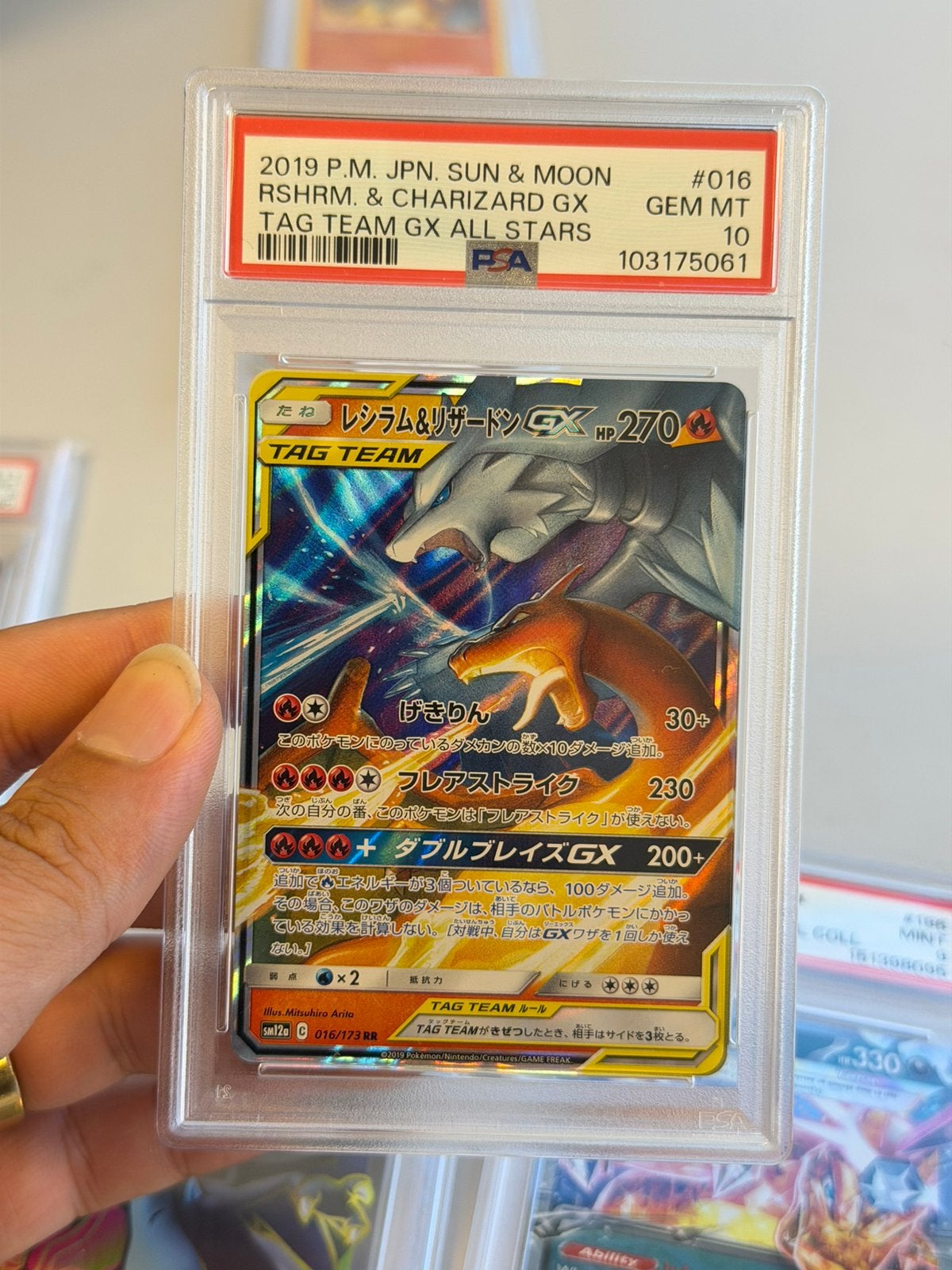 Reshiram & Charizard GX 016/173 RR PSA 10 Tag Team 2019 JPN, Ophalen of Verzenden, Nieuw, Losse kaart