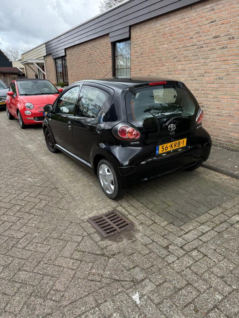 Toyota Aygo 1.0 12V Vvt-i 5DRS 2010 Zwart, Auto's, Toyota, Voorwielaandrijving, 4 stoelen, Origineel Nederlands, Handgeschakeld