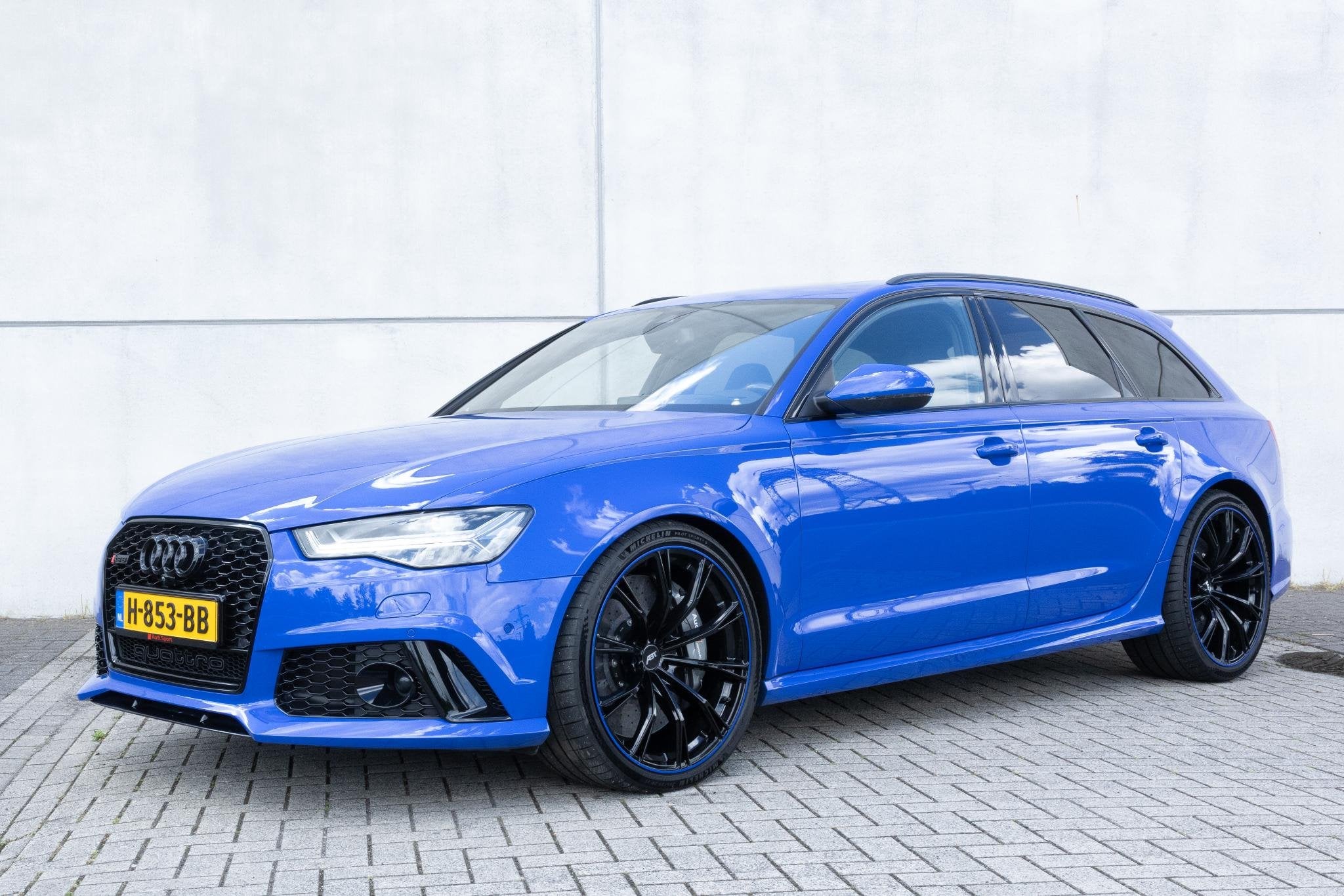 Audi A6 Avant 4.0 TFSI RS 6 quattro performance Pro Line Plu, Auto's, Automaat, Gebruikt, Blauw, Verwarmde buitenspiegels