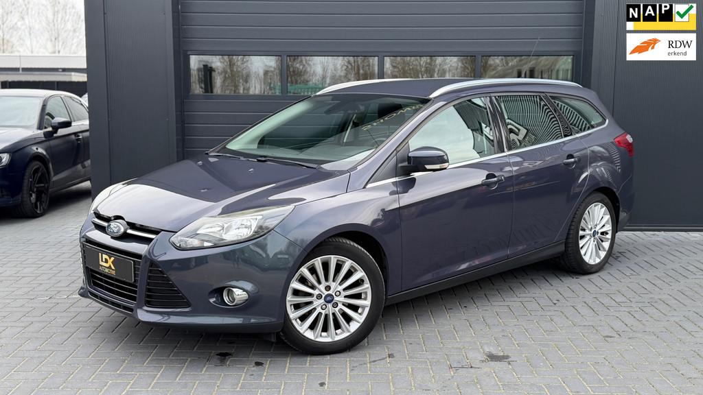 Ford Focus Wagon 1.0 EcoBoost Titanium Airco|Navi|Trekhaak, Auto's, Euro 5, 125 pk, Gebruikt, Leder en Stof