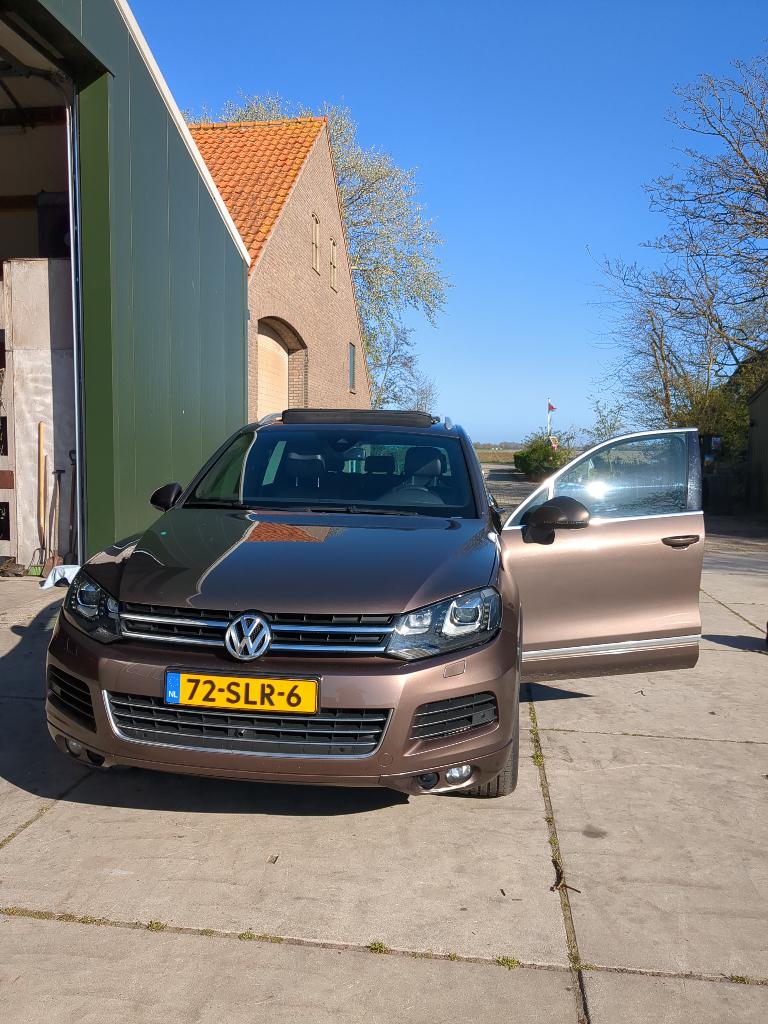 VW Touareg 3.0 V6 TDI 180KW BMT 4M AUT 2011 GoudBruin, Euro 5, Zwart, Bruin, 255 €/maand