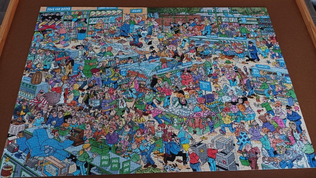 Te koop: dubbele puzzel Jan van Haasteren., Ophalen of Verzenden, 500 t/m 1500 stukjes, Zo goed als nieuw, Legpuzzel