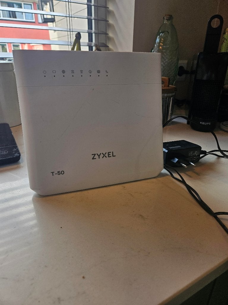 Zyxel T-50 modem/router – goed werkend, Computers en Software, Ophalen of Verzenden, Gebruikt, Router met modem, Zyxel