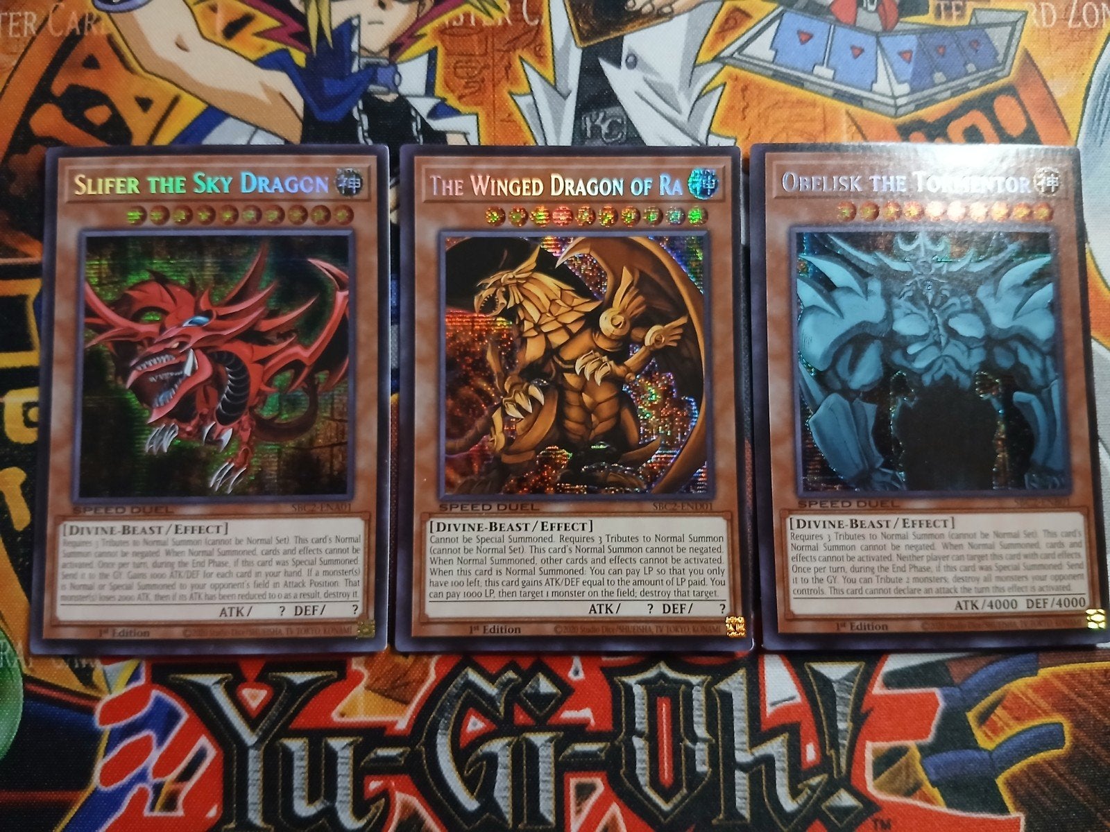 Egyptian God Set - Secret Rare SBC2 - Yu-Gi-Oh, Ophalen of Verzenden, Zo goed als nieuw, Meerdere kaarten, Foil