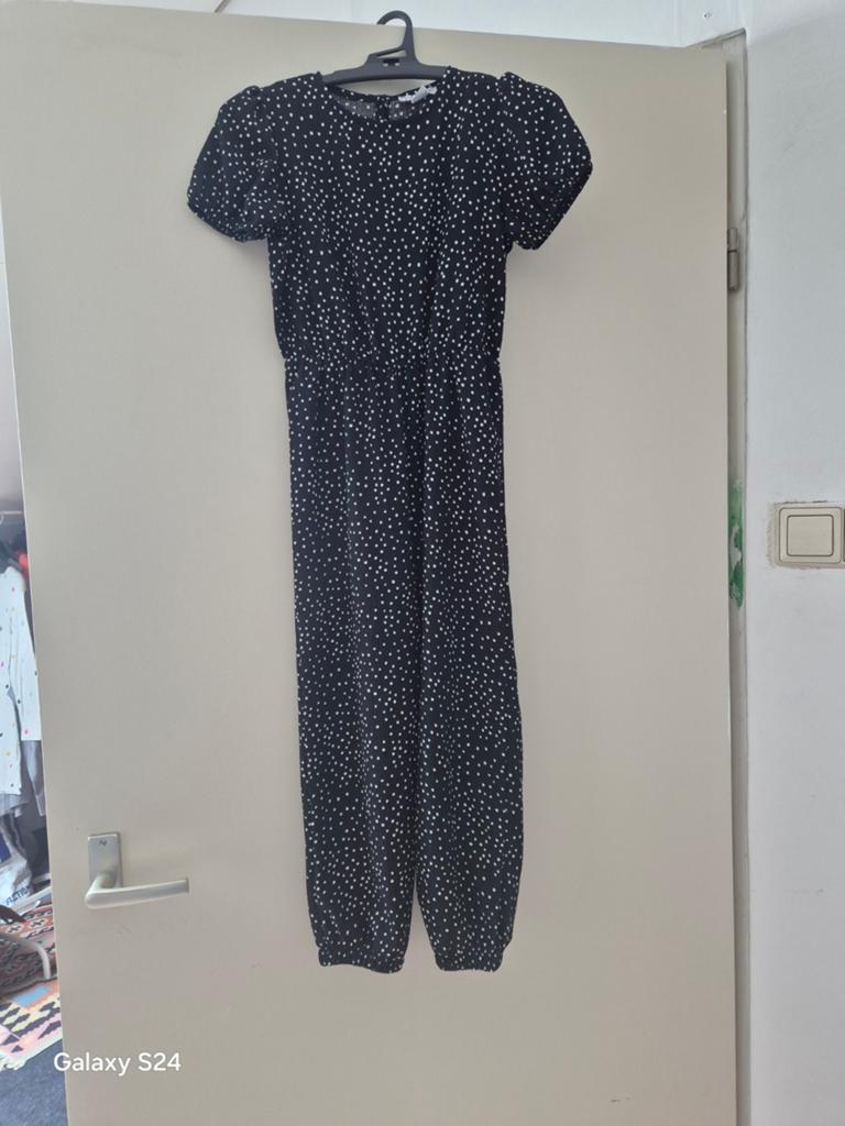 Zwarte Jumpsuit met Witte Stippen - Maat 128, Overige typen, Meisje, Ophalen of Verzenden, Zo goed als nieuw