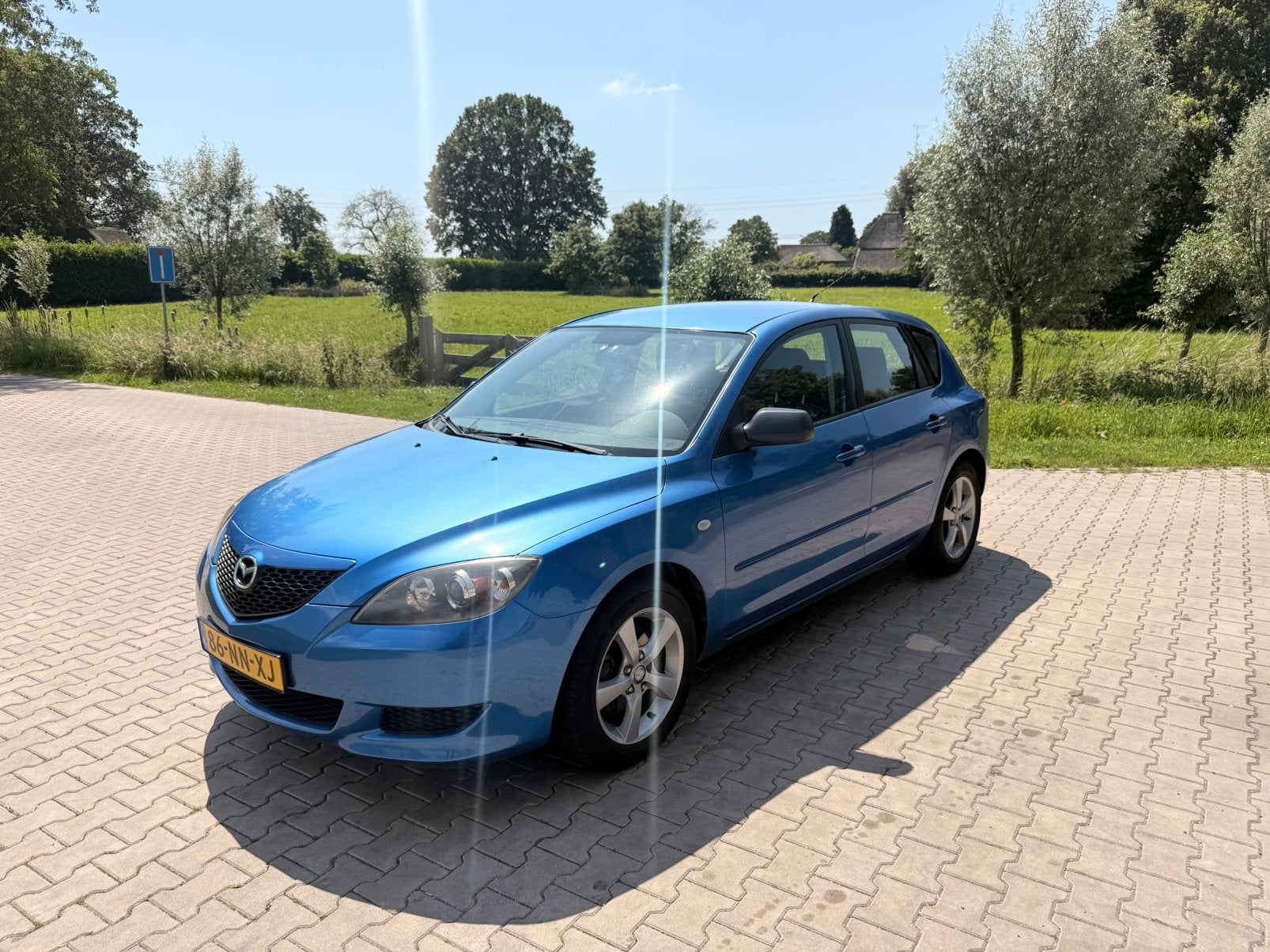 Mazda 3 1.6 Hatchback 2004 Blauw, Voorwielaandrijving, 1160 kg, Stof, 4 cilinders