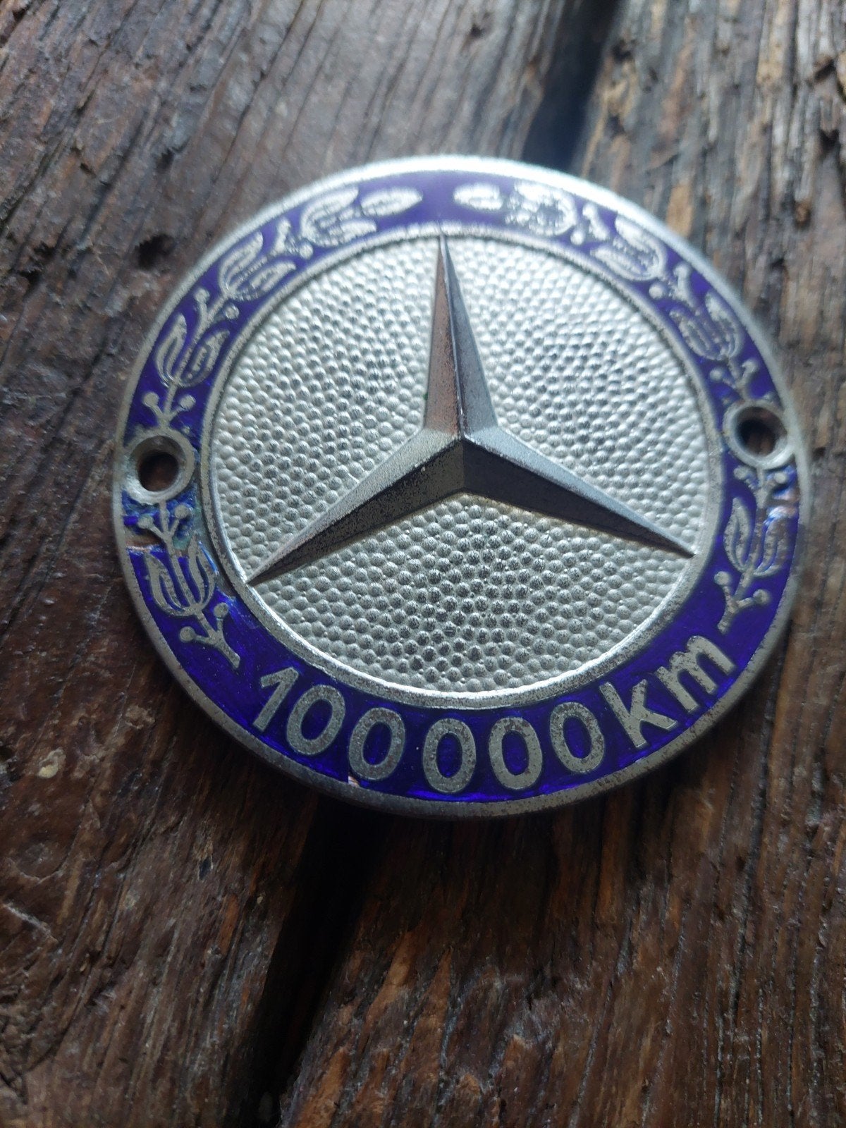 Mercedes grille badge plaatje 100.000km, Ophalen of Verzenden, Huis en Inrichting