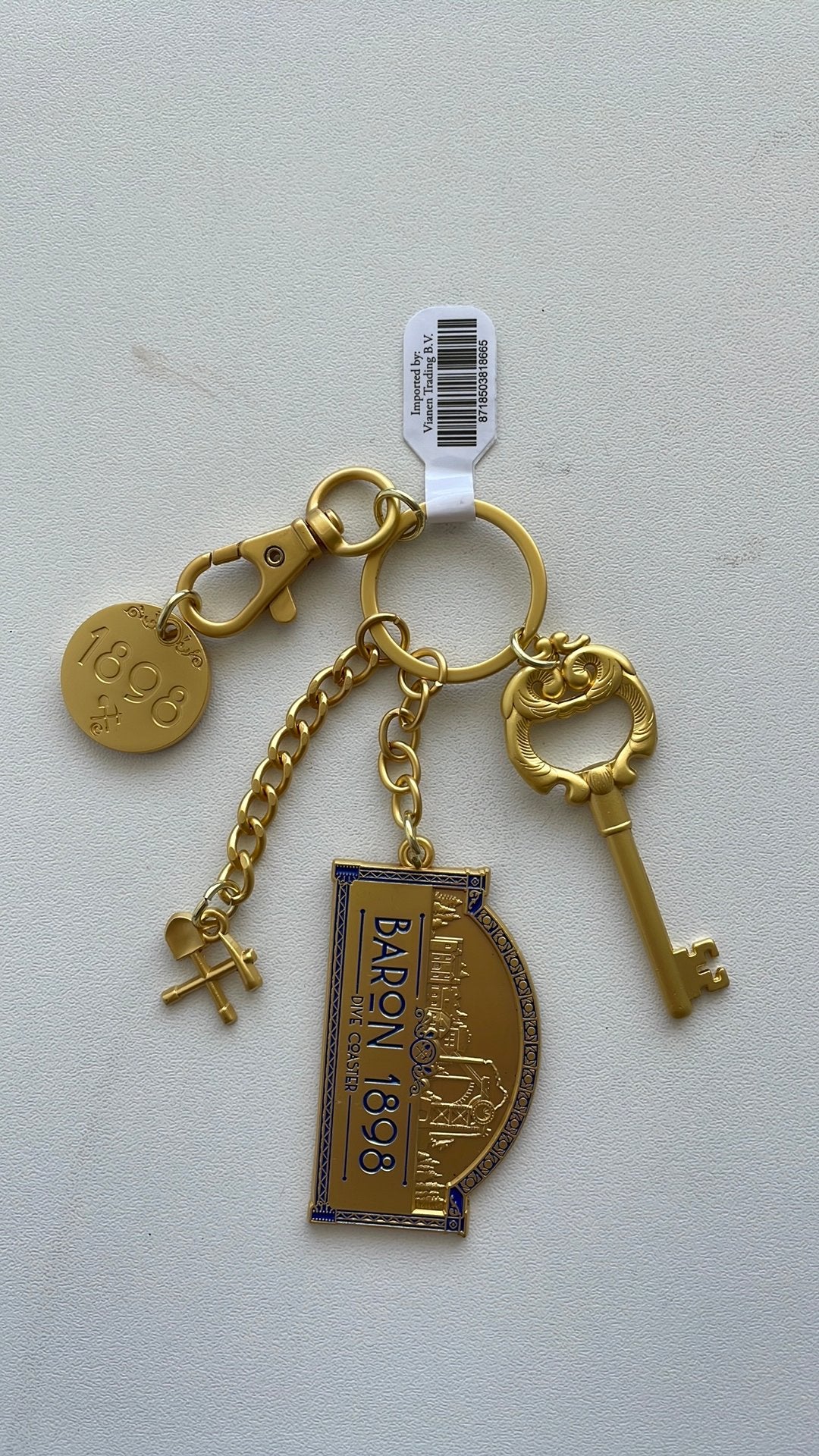Efteling sleutelhanger Baron 1898, Verzenden, Nieuw, Button of Speldje
