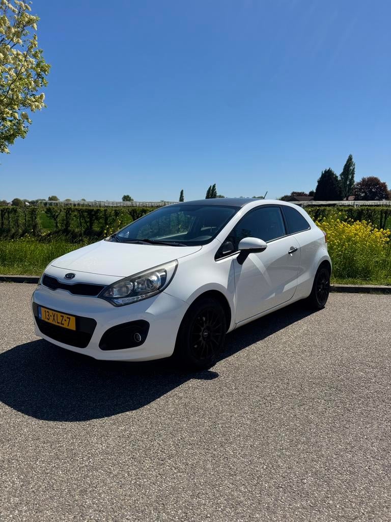 Kia Rio 1.2 CVVT 3DRS 2012 Wit, Auto's, Kia, Bedrijf, Rio, ABS, Airbags, Airconditioning, Bluetooth, Boordcomputer, Centrale vergrendeling