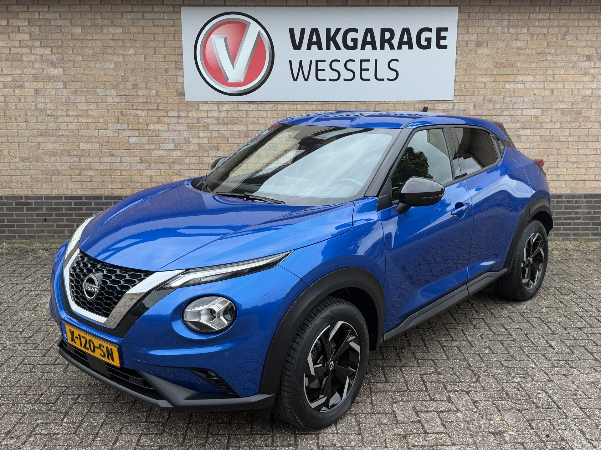Nissan Juke 1.0 DIG-T N-Connecta Automaat | LM | PDC | Camer, Auto's, 12 maanden, Blauw, Automatische klimaatregeling, Origineel Nederlands