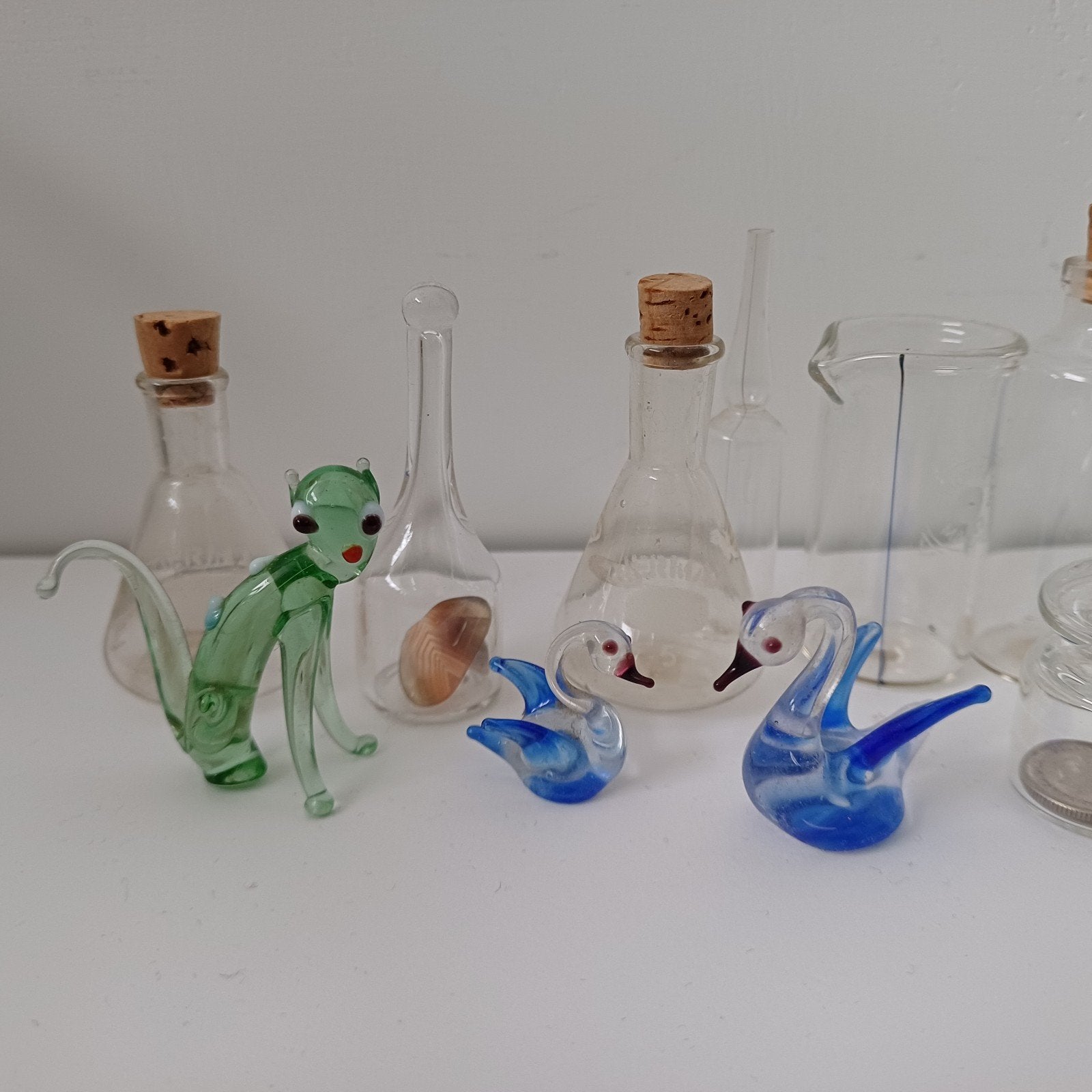 Collectie van glazen miniaturen en flesjes voor de letterbak, Verzamelen, Ophalen of Verzenden, Zo goed als nieuw