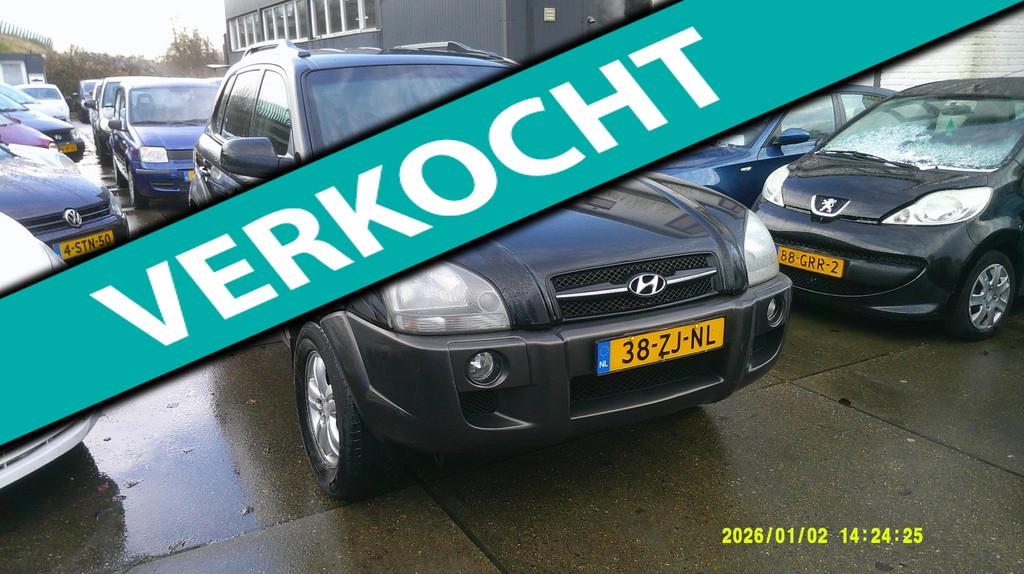 Hyundai Tucson 2.0i Style leer airco elek pak nap apk, Gebruikt, 4 cilinders, Zwart, Origineel Nederlands