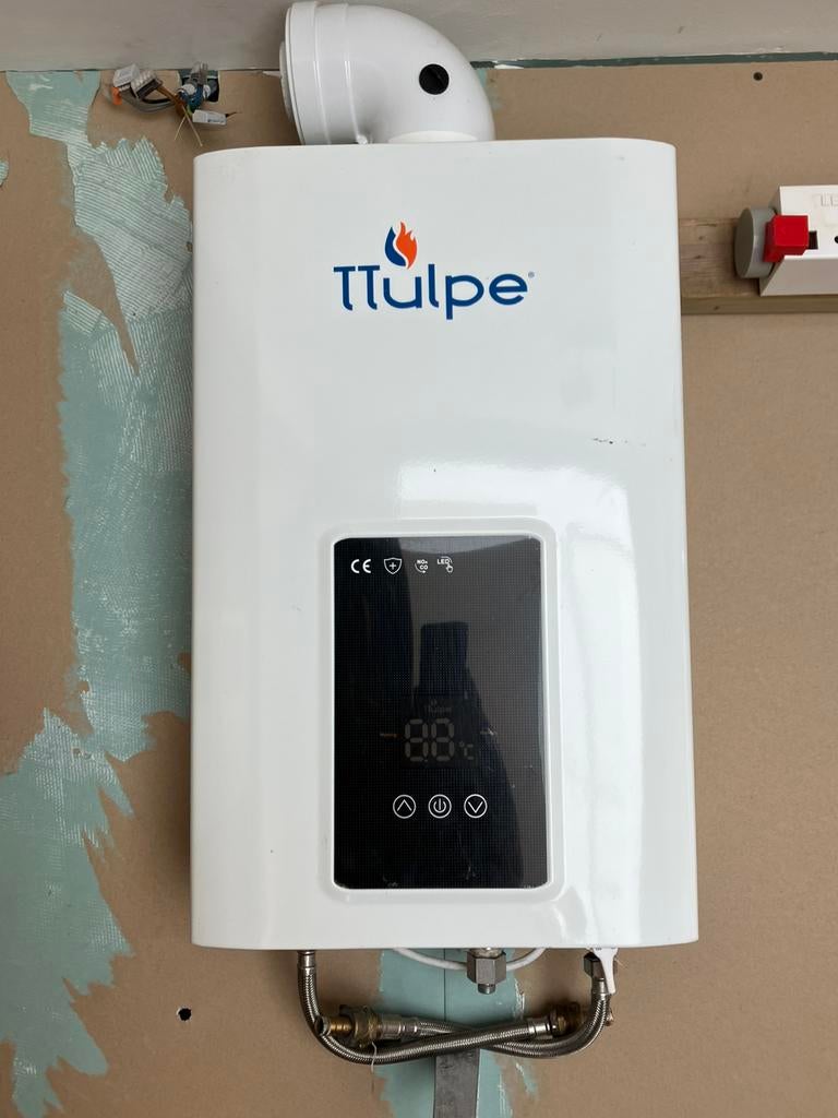 TTulpe Geiser, Doe-het-zelf en Verbouw, Geisers en Boilers, Gebruikt, Geiser, Propaan of Butaan, Minder dan 20 liter, 6 t/m 10 jaar oud