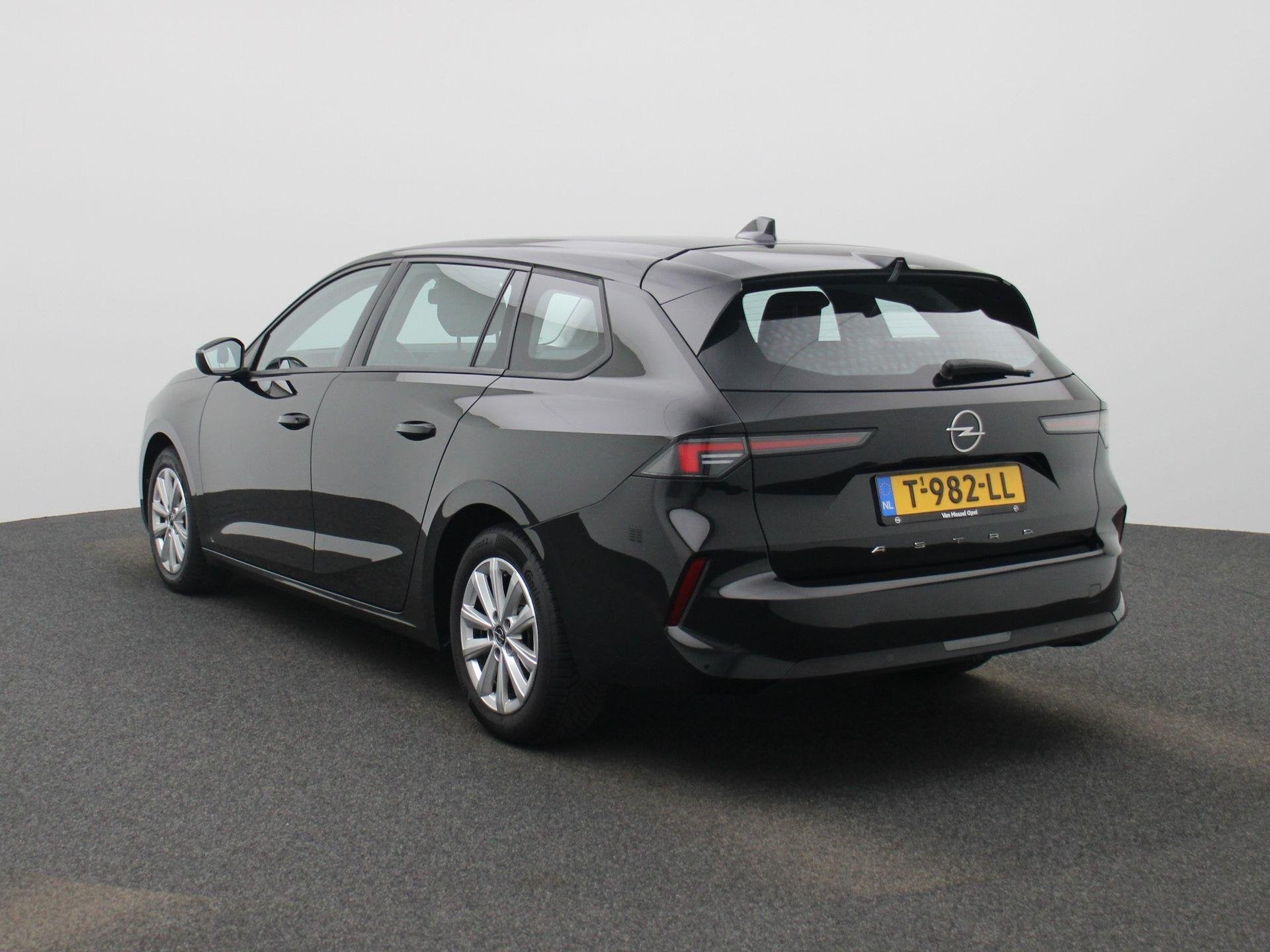 Opel Astra Sports Tourer 1.2 Turbo | Navigatie | Parkeersens, Auto's, Voorwielaandrijving, 12 maanden, Stof, Gebruikt
