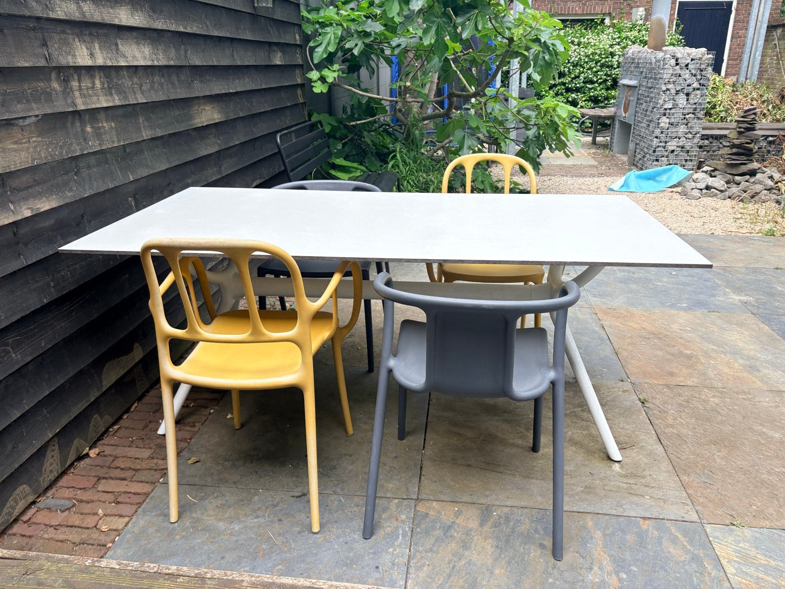 Tuinset met tafel en 4x Magis design stoelen, Tuin en Terras, Tuinsets en Loungesets, Ophalen, Gebruikt, Kunststof, Eettafel