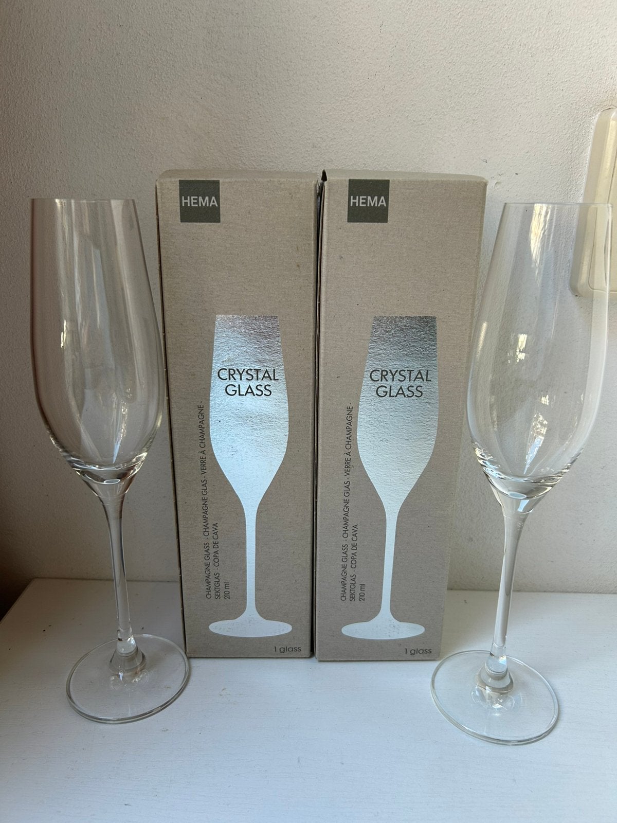 HEMA Crystal Glass Champagneglazen 210 ml 2 stuks, Verzamelen, Glas en Borrelglaasjes, Ophalen of Verzenden, Gebruikt, Overige typen