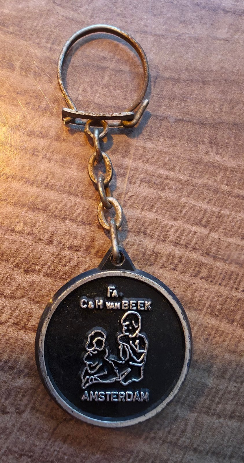 Vintage Reclame Sleutelhanger Fa.C. & H.van Beek Amsterdam, Ophalen of Verzenden, Gebruikt
