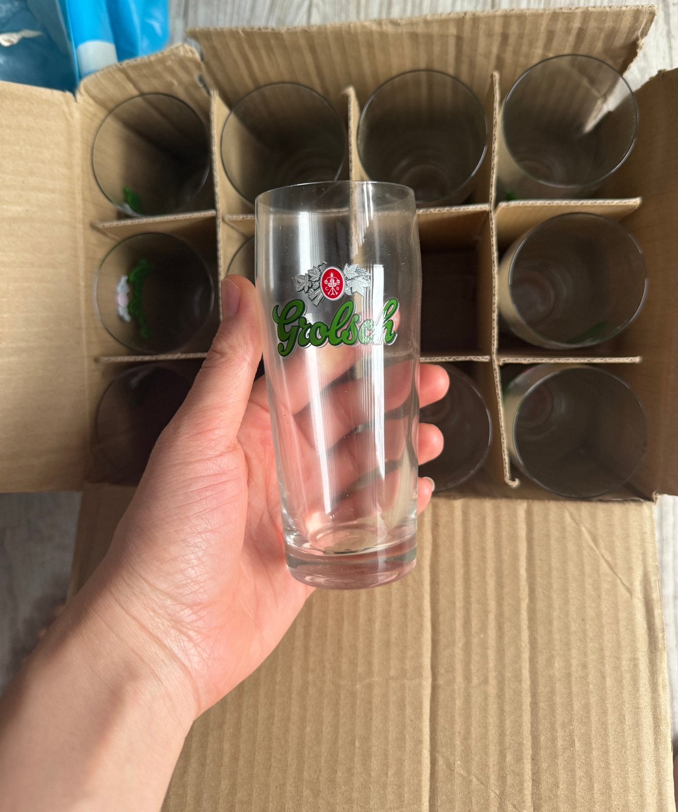 12 Grolsch glazen nieuw in doos, Ophalen of Verzenden, Zo goed als nieuw, Glas, Minder dan 5 flessen