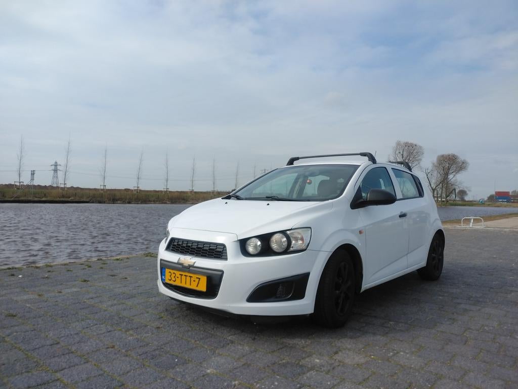 Chevrolet Aveo 1.2 2012 5-d Trekhk Lichtm.velg Apk Feb 2027, Auto's, Chevrolet, Voorwielaandrijving, Stof, 40 €/maand, Aveo