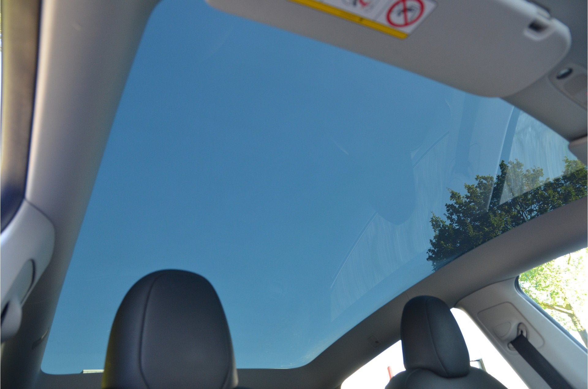 Tesla Model Y Long Range AWD 75 kWh Trekhaak (1.600kg) AutoP, Auto's, Automaat, Gebruikt, Zwart, Leder
