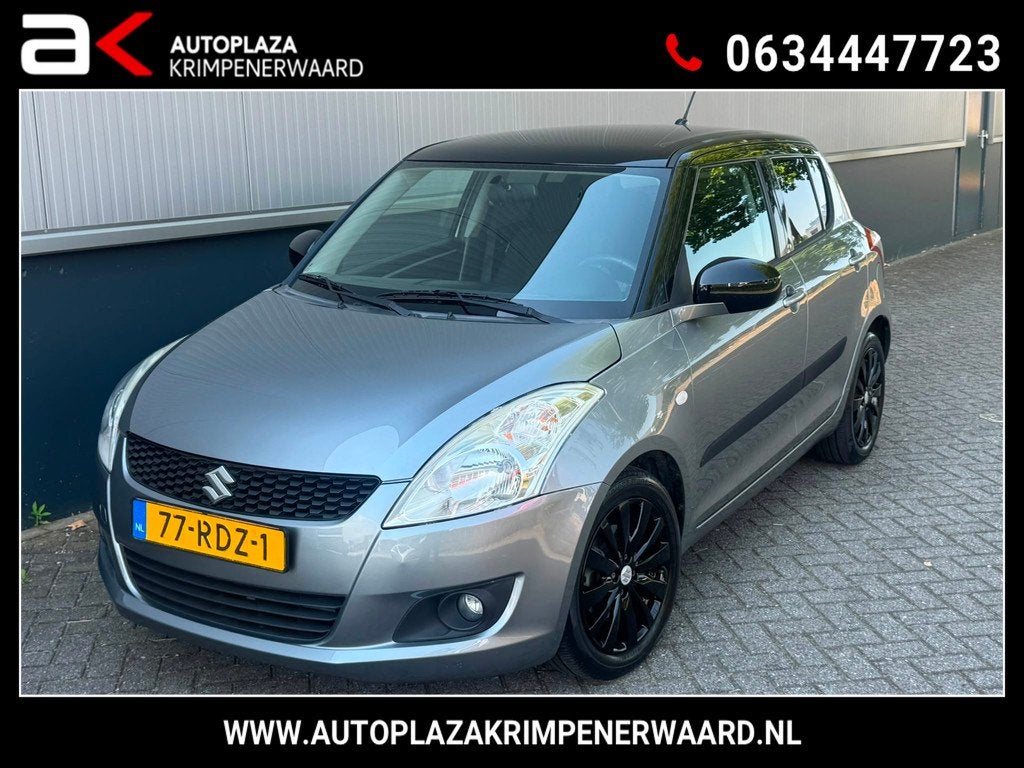 Suzuki Swift 1.2 Exclusive EASSS carplay Nieuwe apk 39000km, Auto's, Voorwielaandrijving, Stoelverwarming, Gebruikt, 4 cilinders