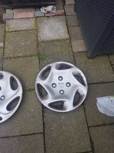 2x Peugeot wieldoppen, Auto diversen, Wieldoppen, Ophalen of Verzenden, Gebruikt