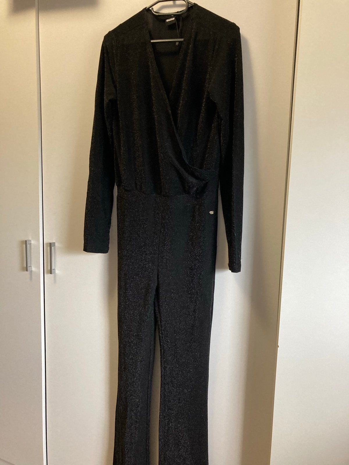 Nieuw - Coolcat zwarte glitter jumpsuit.170/176, Ophalen of Verzenden, Nieuw, Meisje, Overige typen