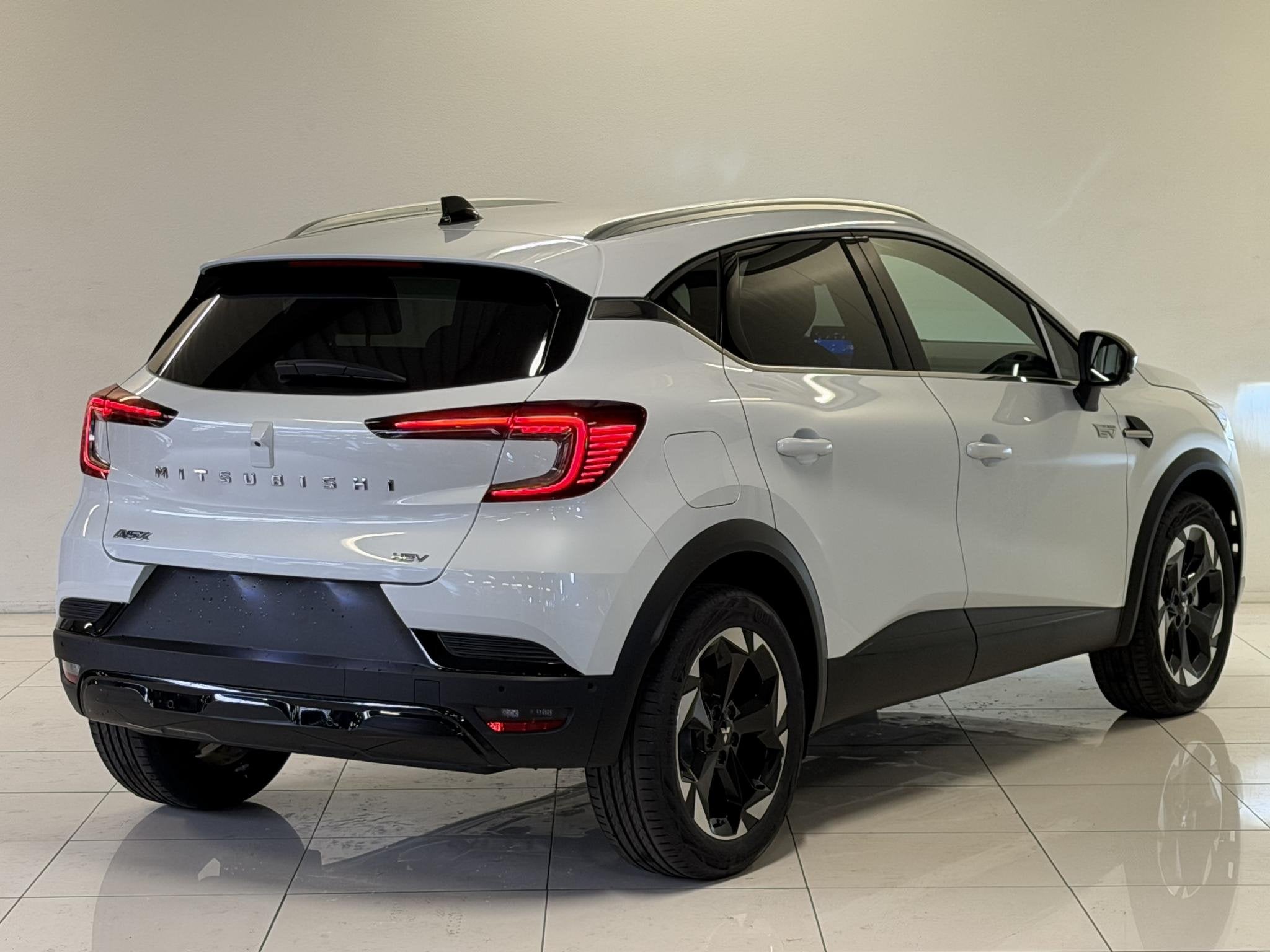 Mitsubishi ASX 1.8 HEV 160 AT Intense+ | Van: € 39.200,- n, Auto's, Stof, 4 cilinders, Met garantie (alle), Wit