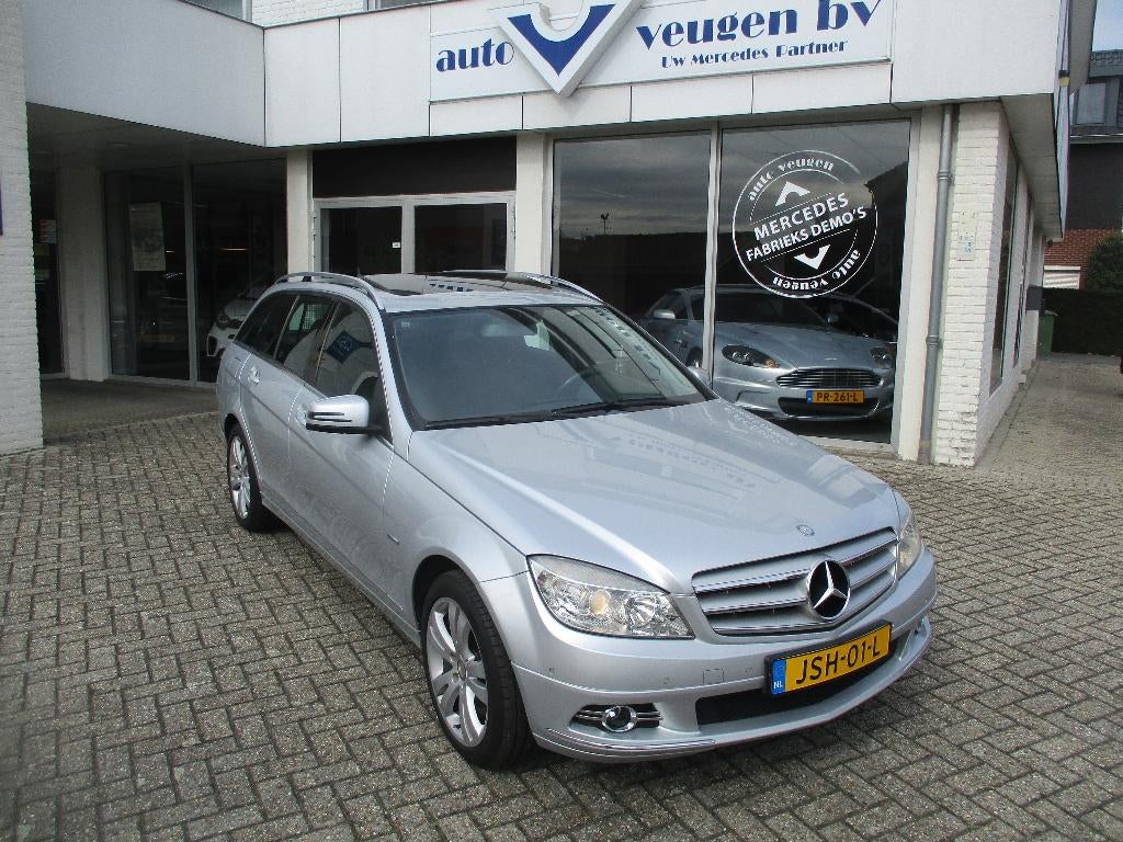 Mercedes-Benz C-Klasse 1.6 C180 Kompr. Estate AUT 2009 Grijs, Auto's, Achterwielaandrijving, 1800 kg, Zwart, Met garantie (alle)
