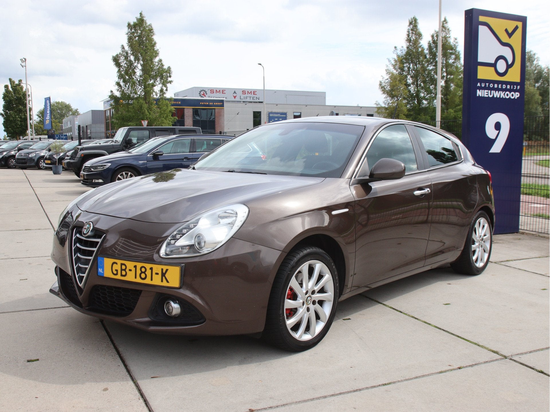 Alfa Romeo Giulietta 1.4 T Distinctive automaat NL auto, Tre, Auto's, Stof, Euro 6, 4 cilinders, Bruin