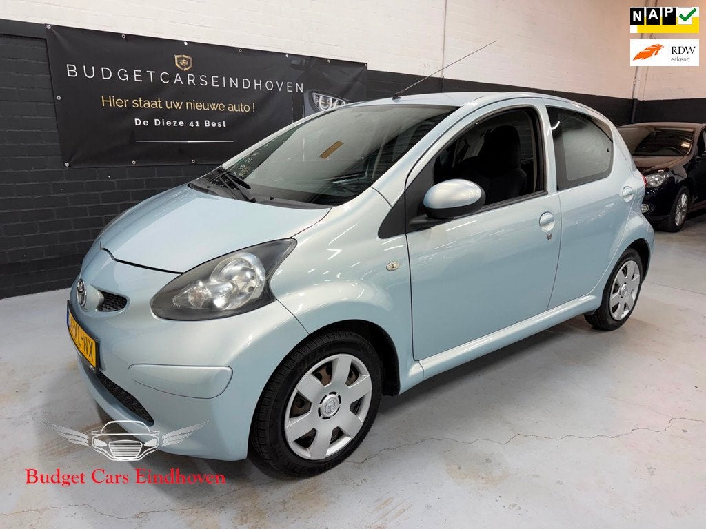 Toyota Aygo 1.0-12V + Nap/5Drs/Navi/APK!, Auto's, Voorwielaandrijving, Stof, Gebruikt, 68 pk