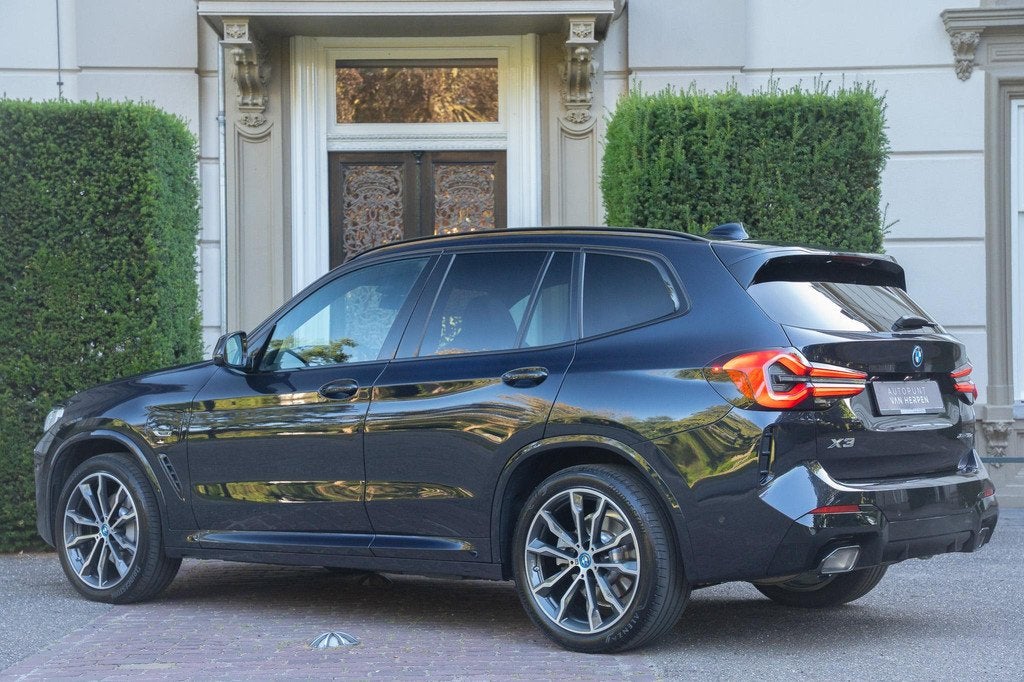 BMW X3 xDrive30e High Executive TREKHAAK | PANO | LASER | HU, Auto's, BMW, 1998 cc, 4 cilinders, 2000 kg, Leder en Stof