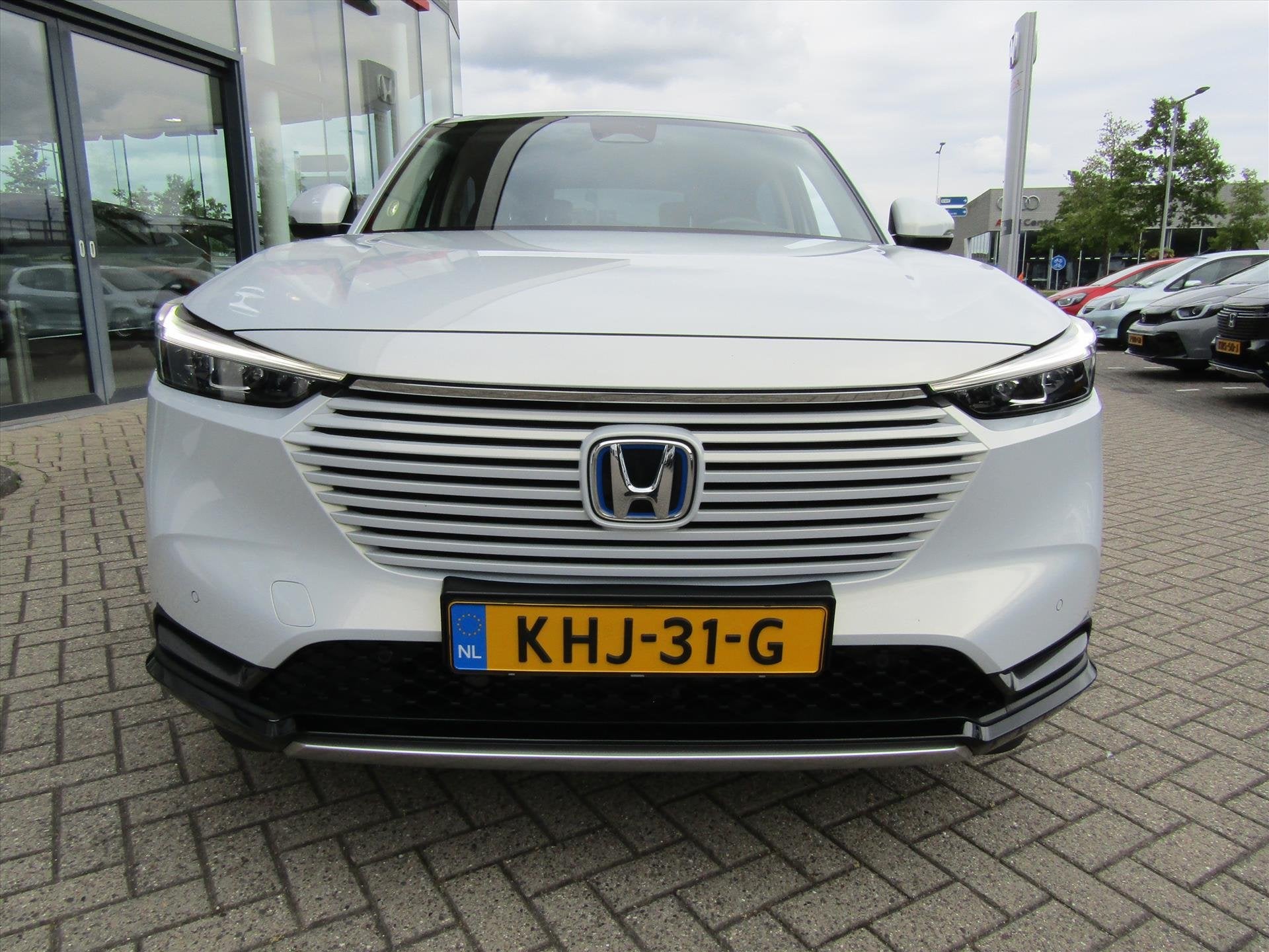 Honda HR-V 1.5 i-MMD 131pk CVT Advance,Allweather banden, Leder en Stof, Wit, Bedrijf, 19 km/l