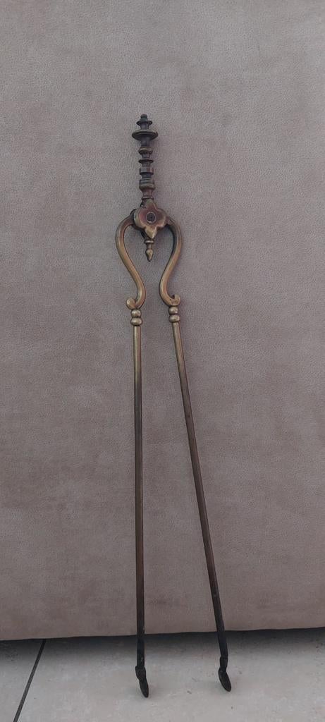 Antieke koperen haardtang - sierlijk en functioneel, Antiek en Kunst, Antiek | Koper en Brons, Ophalen of Verzenden, Koper