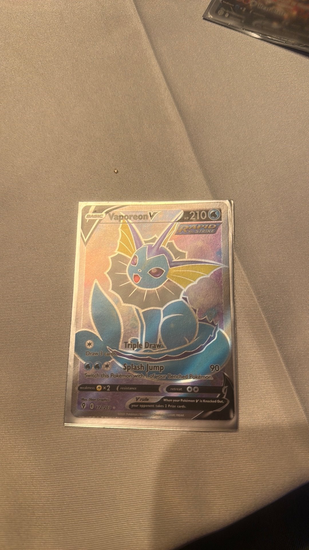 Vaporeon V, Ophalen of Verzenden, Zo goed als nieuw, Losse kaart, Foil