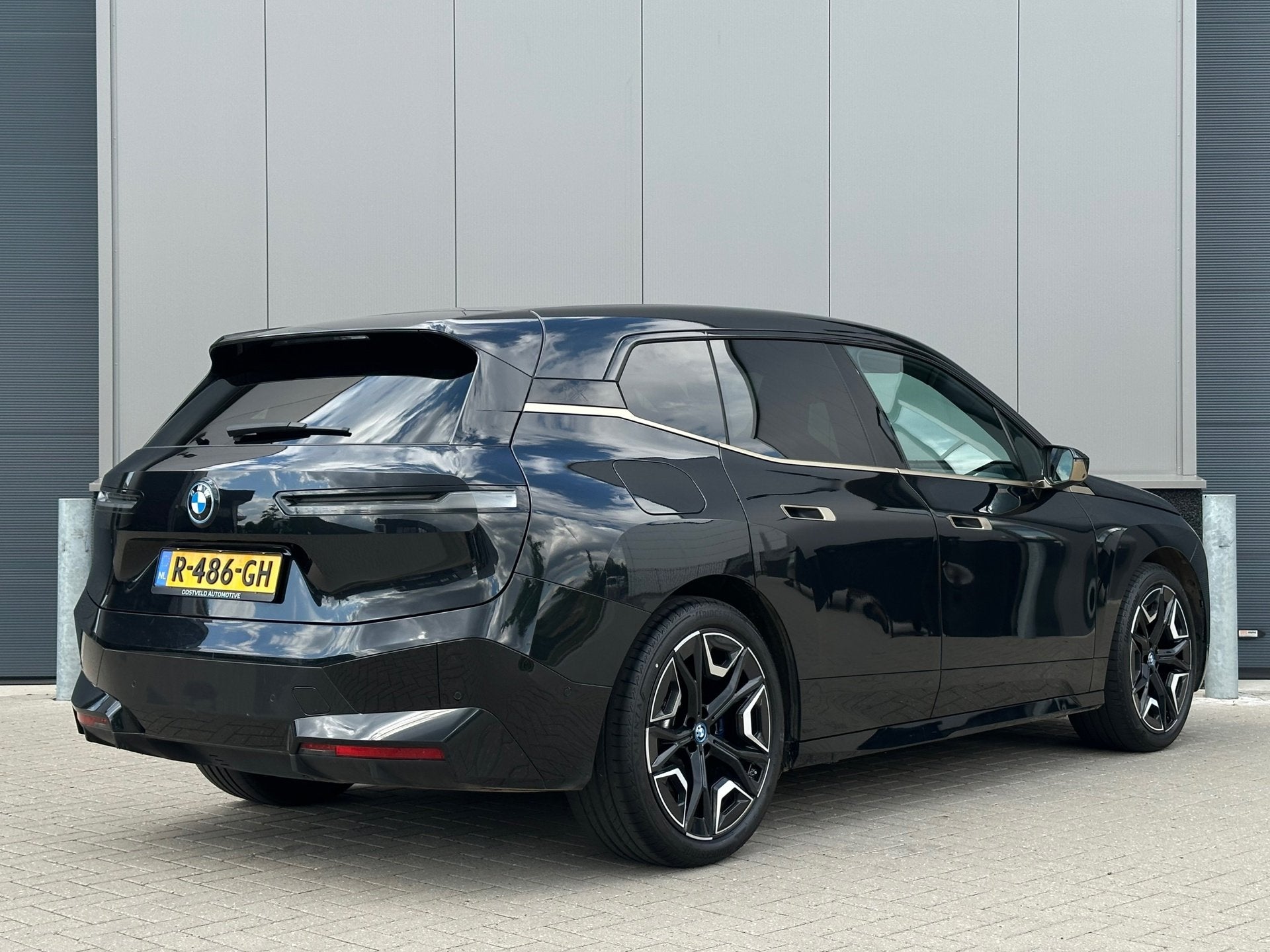 BMW IX XDrive40 Executive 77 kWh |100% SOH|LASER|PANO|GOLD|, Automaat, Gebruikt, Zwart, Vierwielaandrijving