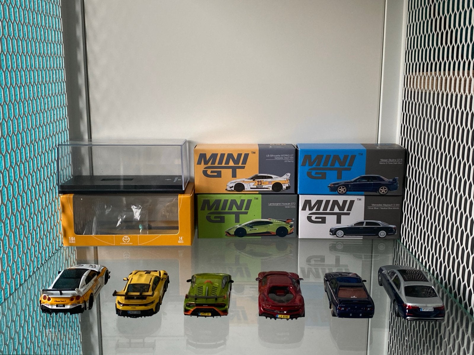 1:64 modelauto's (MiniGT, Centauria, Time Micro), Hobby en Vrije tijd, Ophalen of Verzenden, Zo goed als nieuw, Auto