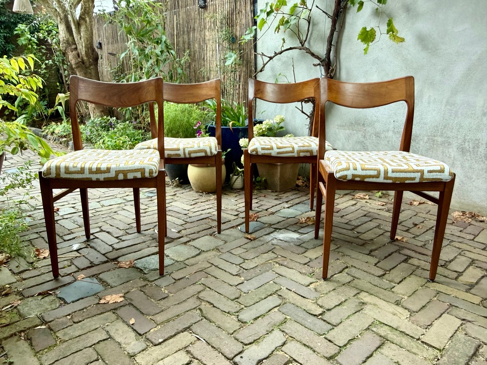 Set van 4 Deense vintage eetkamerstoelen in teak, Ophalen