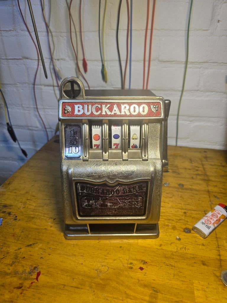 Vintage Buckaroo Bank gokautomaat spaarpot, Overige munten, Ophalen of Verzenden, Gebruikt