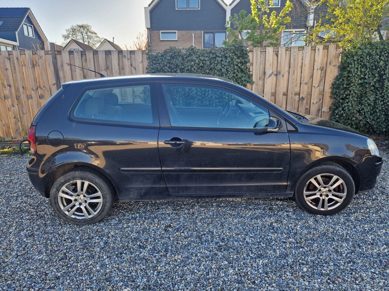 Volkswagen Polo 1.2 40KW 2005 Zwart, Auto's, Voorwielaandrijving, 54 pk, 989 kg, 1198 cc