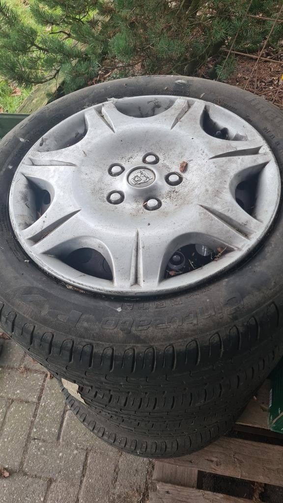 Jaguar X Type stalen velgen met wieldop op zomerbanden, Ophalen