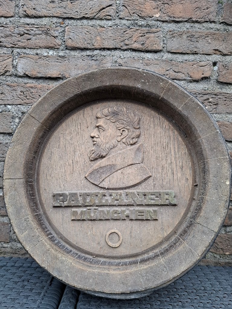 Reclamebord Paulaner in de vorm van tondeksel, Verzamelen, Biermerken, Ophalen of Verzenden, Nieuw, Reclamebord, Plaat of Schild
