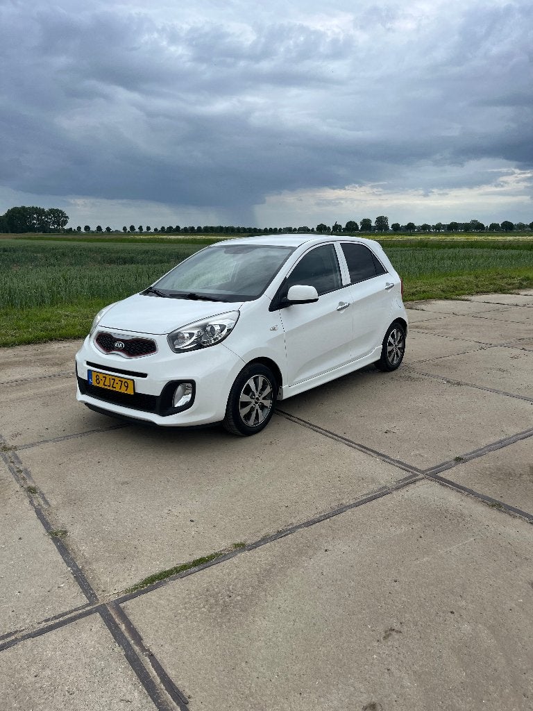 Kia Picanto 5-DRS 2015 Wit, Airco, Leer, APK 2027, Voorwielaandrijving, 400 kg, Wit, Origineel Nederlands