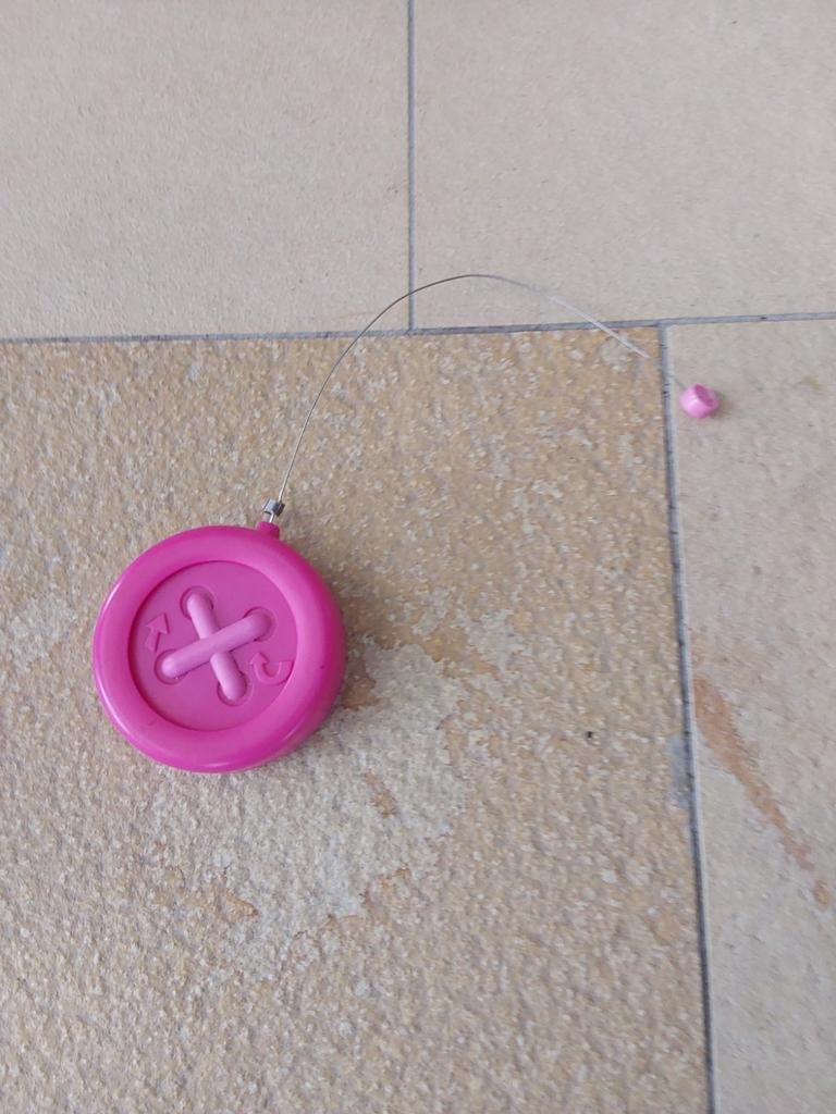 Roze speelgoed met draad, Ophalen, Meisje