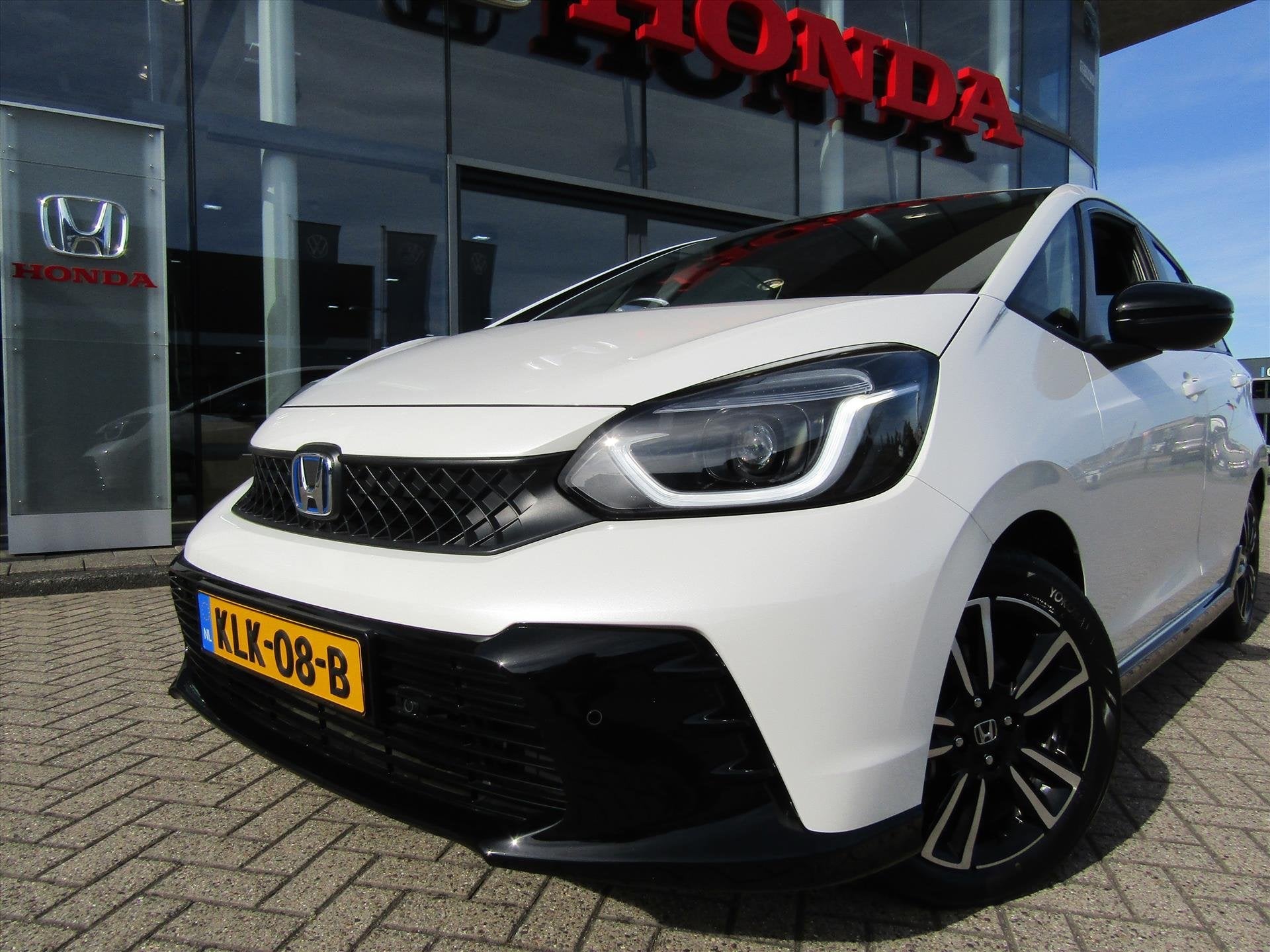 Honda Jazz 1.5 i-MMD 122pk Hybrid CVT Advance Sport, Trekhaa, 4 cilinders, Leder en Stof, Wit, Bedrijf