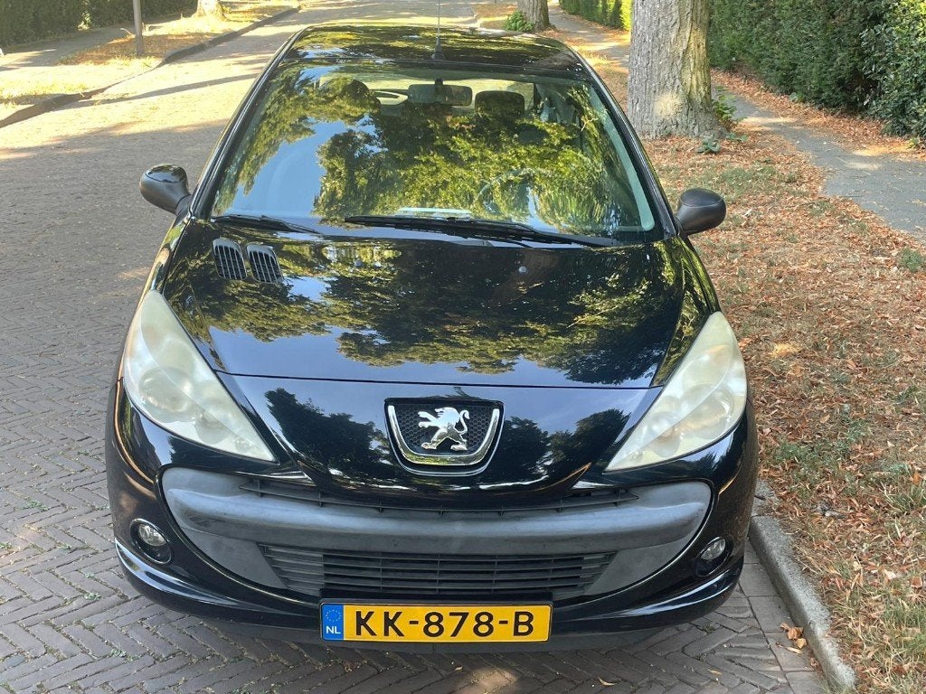 Peugeot 206+ 1.4 3D 2010 Zwart, Auto's, Voorwielaandrijving, 206+, Stof, 4 cilinders